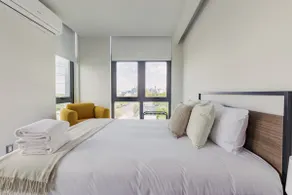 Urban 1BR Apt w/ AC & Skyline Views - VIATO HOMES - Image 2
