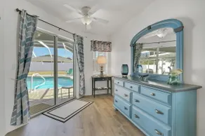 Contemporary coastal escape with heated pool, fenced yard, & outdoor dining - Image 2