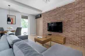 Wyjątkowy Apartament z Parkingiem by Noclegi Renters - Image 3