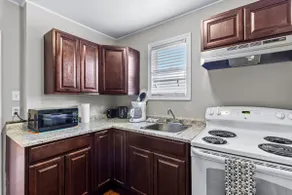 Modern 2BR Suite Parking Laundry - Image 2