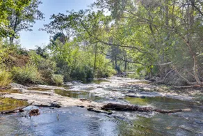 On-site Creek & Spacious Yard: Family Gem in Royal - Image 3