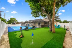 FUN! - 12 min to Beach, 10 min to IMG, Heated Pool - Image 3
