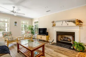 Palmetto-lined home w/ porches, yard & near beach - Image 5