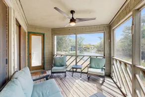 First-floor villa w/ lagoon views & screened porch - Image 3