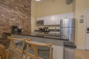Stylish Exposed Brick 3 Bedroom - Image 4