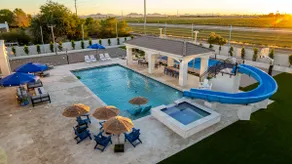 The Grand Oasis-V-ball-30'waterslide-hot tub-sauna - Image 3
