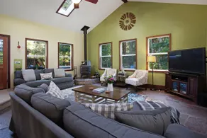 Tree-lined Home with Hot Tub Firepit & Large Yard - Image 4
