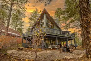 Modern Mountain Chalet with Wall-of-Windows Forest Views. - Image 2