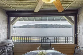 Charming Lakeside Condo with Private Balcony + BBQ - Image 5