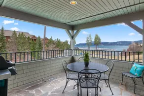 Scenic Waterfront Haven with Private Balcony & BBQ - Image 4