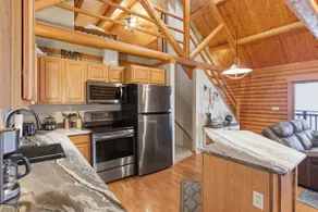 Lakefront Log Cabin with Private Dock, Two Decks & Cozy Comfort at 35mm in Sunrise Beach - Image 2