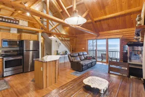 Lakefront Log Cabin with Private Dock, Two Decks & Cozy Comfort at 35mm in Sunrise Beach - Image 3