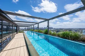 Skyline Serenity with Rooftop Pool - Image 2