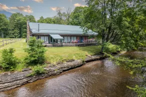 Rapid River Lodge: Summer Vacation Awaits! - Image 2