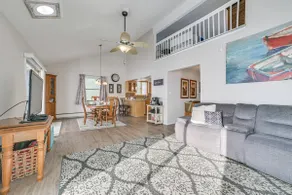 Porch + Views: Waterfront Home on Houghton Lake! - Image 5