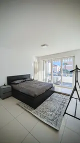 Modern app. w. Balcony &AC, 500m from Lake & Train - Image 3