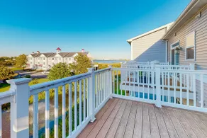 Dog-friendly, water-view townhome with shared pool - Image 3