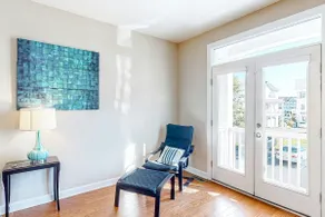 Dog-friendly, water-view townhome with shared pool - Image 5