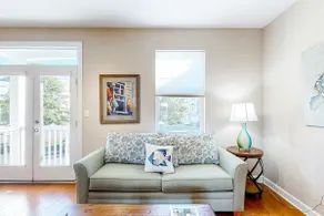 Dog-friendly, water-view townhome with shared pool - Image 4