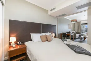 Top Floor Tropical Escape with King Bed, Pool & Balcony - Image 3