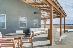 Patio & Fishing Pond! Modern Barndominium Near KC - Image 2