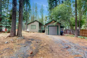 Conveniently located with large deck & fireplace - - Image 2