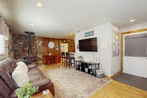 Conveniently located with large deck & fireplace - - Image 5