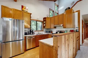 Forested home with fireplace & EV charger near Anc - Image 4