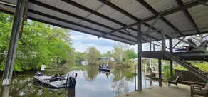 Waterfront 2BR Retreat w Private Dock - Image 3