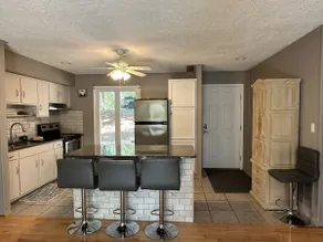 Humble Hideaway - Inviting lakefront home with firepit, balcony & W/D - dog-friendly - Image 3
