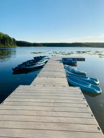 lakefront cabin with boats, sauna, hot tub, fire pits, trails, fishing gear - Image 4