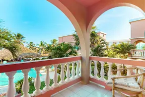 Ocean-view studio with pool, WiFi & partial AC - steps from the beach - Image 5