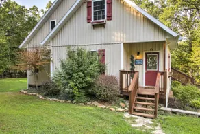 Hot Tub & Wooded Views: Lakefront Blue Eye Cottage - Image 2