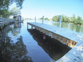 Manistee Channel Waterfront Home with Boat Dock - Image 4