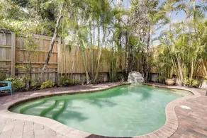 The Periwinkle House - Bask Poolside at this Sunlit West Palm Retreat - Image 2