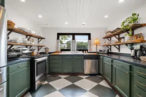 Delightful DT Bungalow | Firepit · Walk to Town - Image 3