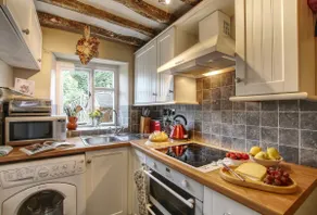 Bay Tree Cottage  is tucked away in an elevated position on the edge of a pretty village. - Image 3