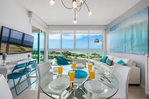 Amazing sunsets from a relaxing blue condo décor - Image 4