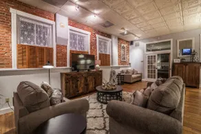 Elegant Loft-Style Retreat in Old Firehouse Alley - Image 2