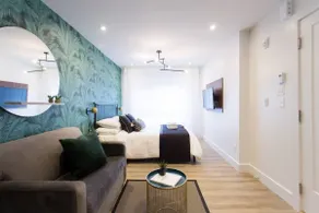 Studio Palms Steps from JeanTalon Market Full Bath by Den Stays - Image 2