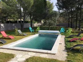 a pretty family house with a heated pool and a pre - Image 4