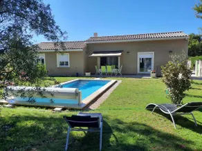a pretty family house with a heated pool and a pre - Image 2