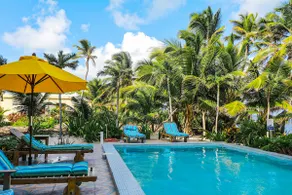 Beachfront dog-friendly condo with pool - walk to ocean from beachfront veranda - Image 2