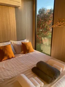 Tiny House Stay with Cozy Fireplace and Nature Views in Koonoomoo, Australia - Image 3