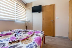 Holiday home with barbecue & garden | Next to the beach - Image 2