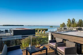 Ferienhaus mit Whirlpool, Sauna und Terrasse | Seeblick - Image 2