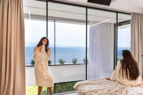 ESCAPE TO SERENITY: Modern 2 Bedroom Villa with Private Heated Infinity Pool, BBQ area, Large Garden, Jacuzzi, and Sauna with Breathtaking Sea Views - Image 5
