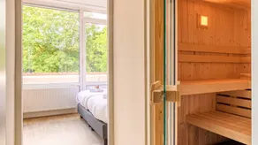Appartement avec jacuzzi, jardin et sauna - Image 5