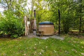 Luxury wellness cabin with freestanding bathtub, infrared sauna, hot tub and outdoor shower, directly next to Dwingelderveld National Park. - Image 2