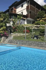 Apartment mit Pool, Sauna und Garten - Image 3